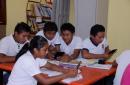 children learning with their Kindles